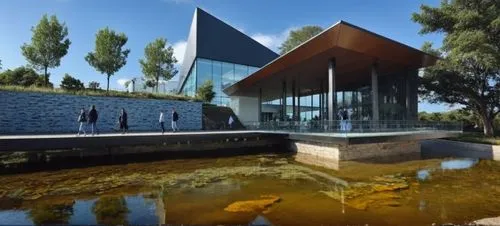 LAGO ,people walking on a walkway near a lake and water fountain,sumapaz,jasenovac,k13 submarine memorial park,siza,aqua studio,snohetta