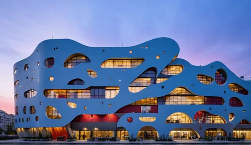 elbphilharmonie,building honeycomb,hotel w barcelona,honeycomb structure,cubic house,guggenheim museum,hotel barcelona city and coast,artscience museum,cube stilt houses,cube house,mixed-use,walt disn