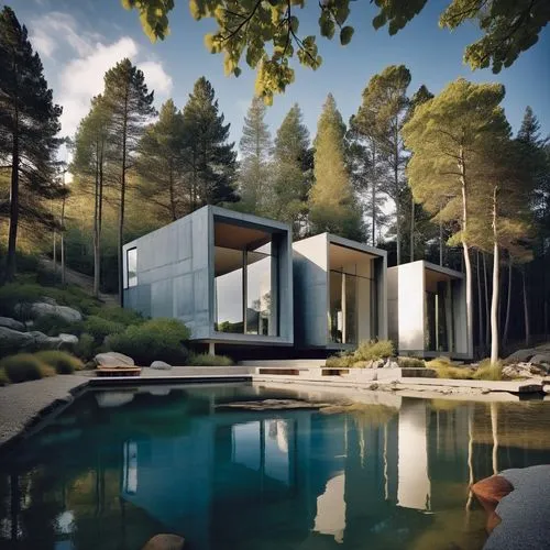 In the heart of a dark and barren wasteland, three cozy cabins crafted entirely from polished steel pieces stand side by side. The interior of the cabin is a minimalist masterpiece, with clean lines a