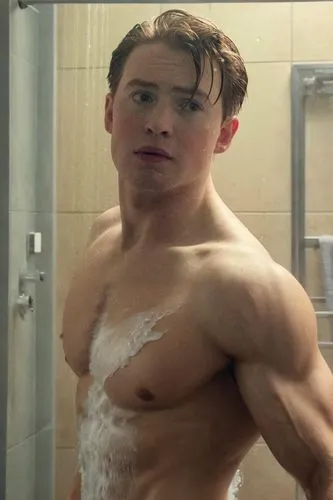 a muscular man in an otherwise enigmatic tone in a state-of-the-art bathroom, snarls and smiles as he takes a gentle shower. His muscles are not visible, leaving only his long, thin muscles curled aro