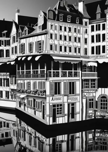 Black and white view of the Auberge du Lyonnais Hôtel/Restaurant and other buildings along the incredible reflective waters of the Thiou Canal, Old Town Annecy, France.,zaandam,nyhavn,honfleur,willems