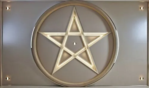 Gypsum decoration in the ceiling of a room with hidden LED lighting the ceiling,a pentagramter star in a circle that is on display,christ star,circular star shield,eckankar,stargates,star of david,tet