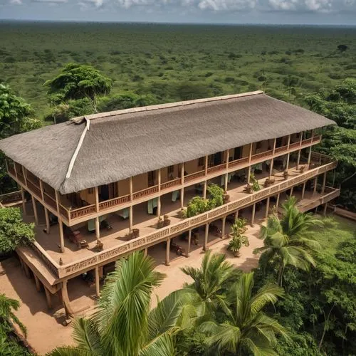 A two story tropical hotel. ,iita,tambopata,gbissau,nainoa,akuapem,ghana ghs,kribi,kibwana,elderhostel,aiyenugba,zambeze,nsukka,bissau,itsekiri,nakaseke,kasulu,krobo,kampamba,kapchorwa,anantara,Photog