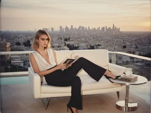 Cara Delevingne, architectural digest, modern villa, luxurious interior, mature lady, 40s, elegant hairstyle, subtle makeup, pearl necklace, white silk blouse, high-waisted black pants, stilettos, sit