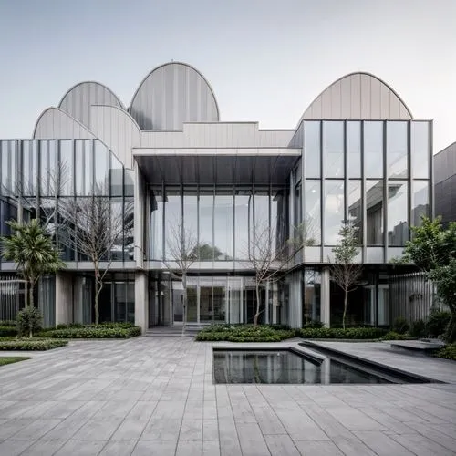 glass facade,shenzhen vocational college,glass facades,archidaily,modern architecture,seminyak,hongdan center,glass building,kirrarchitecture,singapore,asian architecture,frisian house,jakarta,structu