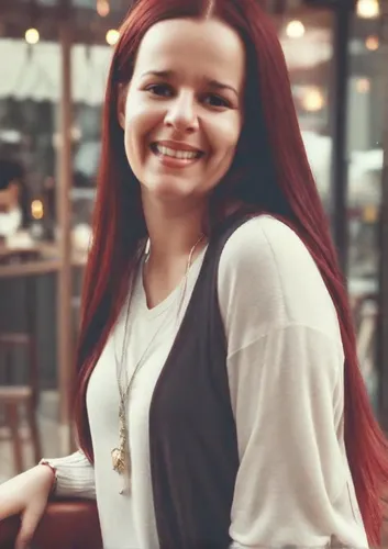 Woman with dark brown eyes, long red hair, wearing urban clothes,redhair,red hair,red-haired,dimple,a girl's smile,crinkle,ariel,raggedy ann,redheaded,red head,princess sofia,yasemin,killer smile,maci