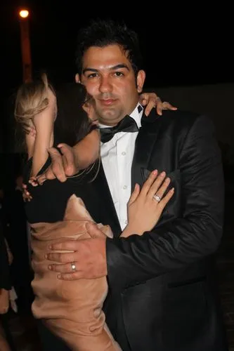 a couple emcing each other wearing evening wear attire,ragheb,shehzad,wael,rannvijay,sarun,simbu,dancing couple,milonga,dewael,vijender,bergersen,casamento,dharmesh,virat kohli,sangeeth,khandelwal,soh