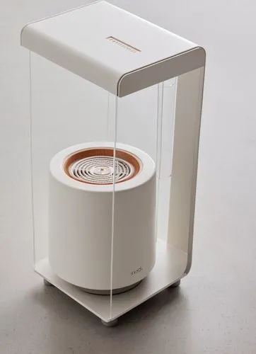 宠物喂食器，有可分离式的喂食盘,a white coffee cup is in a box on the table,ice cream maker,digital bi-amp powered loudspeaker,rice cooker,keurig,dehumidifier,calorimeter,beautiful speaker,maaouya,deskjet,microbrewer