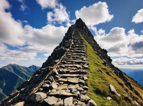 Improve staff wellbeing by setting clear goals - picture of a mountain to climb,stone pyramid,stairway to heaven,alpine crossing,step pyramid,machu picchu,towards the top of man,climbing to the top,ma