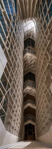 honeycomb structure,building honeycomb,calatrava,hotel w barcelona,spiral staircase,kirrarchitecture,largest hotel in dubai,spiral stairs,santiago calatrava,soumaya museum,futuristic architecture,ceiling construction,winding staircase,wooden construction,multi storey car park,multi-storey,wood structure,archidaily,oasis of seas,escher