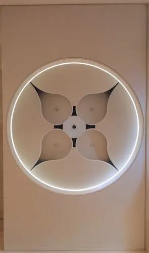 Gypsum decoration in the ceiling of a room with hidden LED lighting,a circular white artwork with lights around it,eero,ceiling lamp,ceiling light,ceiling fan,foscarini,wall lamp,Photography,General,R