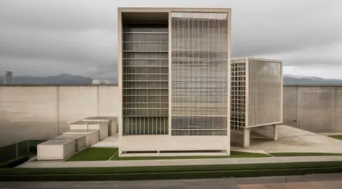 wood and white concrete lattice in the city bogota
,brutalist architecture,archidaily,ica - peru,mortuary temple,chancellery,cooling tower,concrete,athens art school,exposed concrete,concrete plant,mo