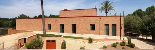 CREATE A FACADE INSPIRED BY A MEXICAN HACIENDA WITH RED BRICK TEXTURES AND PLACE WINDOWS WITH WHITE FRAMES, SOFT SHADOWS AND WARM SUMMER LIGHT,this house is an interesting place to live,uloom,al-askar