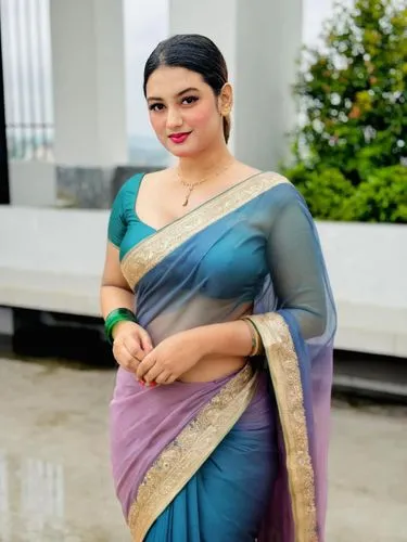 beautiful indian lady in a blue and green saree,hansika,sari,saree,paithani saree,charulata,bindu