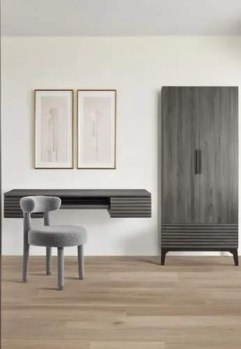 This modern space features a minimalist design with a neutral palette. A sleek, dark grey wood-textured desk and wardrobe with subtle linear detailing dominate the room. The chair has a light grey, so