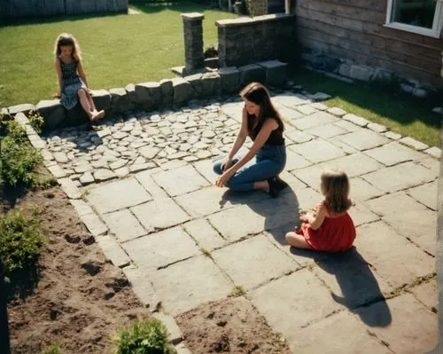 tobermore,paving slabs,quoits,paving stones,children playing,flagstones,paving stone,stone garden,paving,nieces,gardeners,turfing,rockfield,the garden,garden,in the garden,greenfingers,sundials,chippings,diggings,Photography,Documentary Photography,Documentary Photography 02