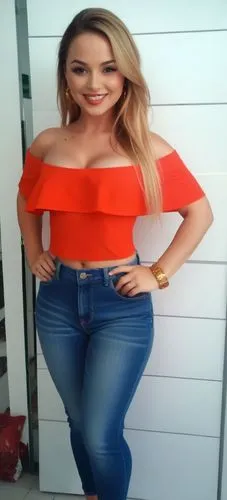 woman in red top standing with her hands on hips,tetas,vorderman,hadise,paraguaya,alejandrina,hermoza