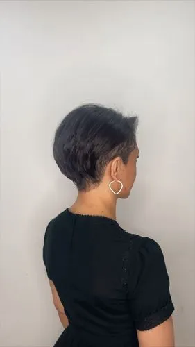 black blouse,a woman with black hair and a black top in profile,undercut,back of head,sternocleidomastoid,shoulder length,updo,connective back