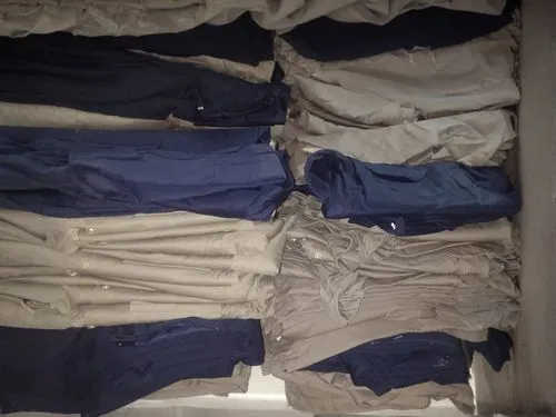 men clothes,khaki pants,trouser buttons,suit trousers,clothes,garment racks,wardrobe,school clothes,clothing,polo shirts,clotheshorse,carpenter jeans,trousers,garments,collection of ties,dry laundry,linen,a uniform,clothes dryer,men's wear