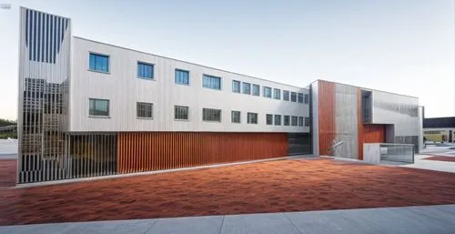 school design,metal cladding,new building,modern architecture,corten steel,modern building,music conservatory,facade panels,biotechnology research institute,archidaily,cubic house,contemporary,state s