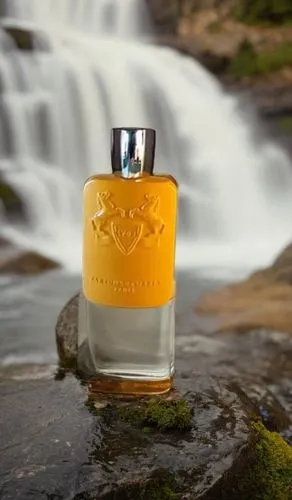 این عطر بزار کنار آباش با طلوع آفتاب,a bottle that is sitting on a rock,orange scent,grossmith,natural perfume,parfumerie,penhaligon,mortlach,Small Objects,Outdoor,Waterfall