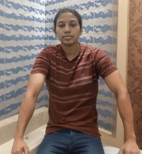 a guy in his underwear sits on a toilet in a bathroom,vaibhav,abhinav,saurav,padmasana,karthik,kafeel