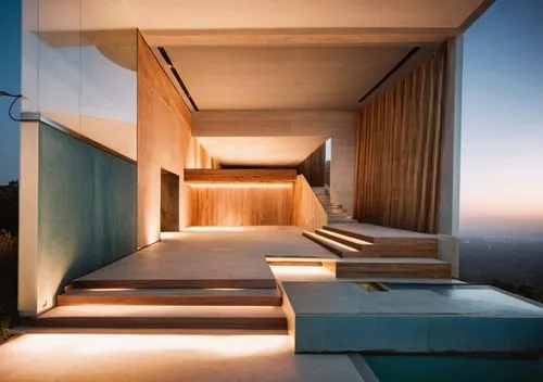 glass woodpanelling office black steel windows tiles offices light sunlight blue night view Spotlights ,an outdoor staircase is lit up with light,amanresorts,dunes house,adjaye,cubic house,corten stee