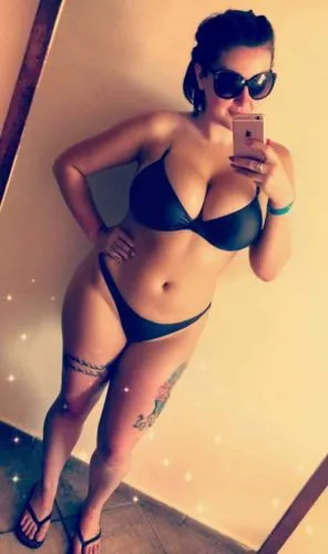 a woman in a bikini taking a selfie,sgh,aboul,bbw,lbbw,namitha,thickness