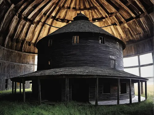 Write a spooky story set in an abandoned round barn.,round barn,round house,dovecote,blackhouse,field barn,witch house,barn,wooden church,old barn,log home,straw hut,timber house,round hut,witch's hou