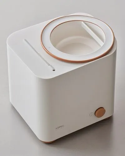 宠物喂食器，有可分离式的喂食盘,a white kitchen device with a golden trim around the edge,ouya,humidifier,dehumidifier,air cushion,ruark,eero,Photography,General,Realistic