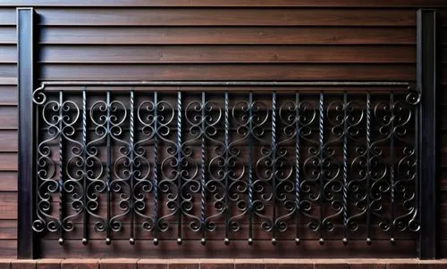 Side view. Forged elegant fence, between two square, black metal columns. Made of black metal. Railing dark wood.
white background,an iron fence against a wall with no door,louvered,metal grille,metal