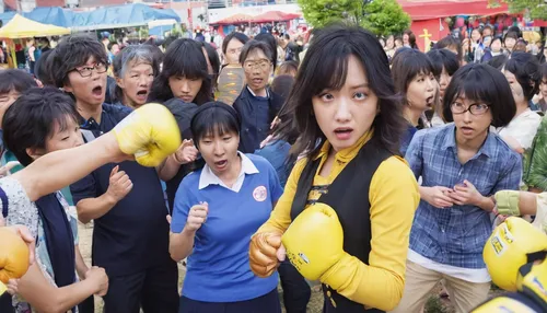 Compose a humorous news piece about a clumsy individual accidentally delivering a punch that causes chaos at a community event.,noodle image,yuzu,japanese fans,yellow cups,surival games 2,yang,korean 