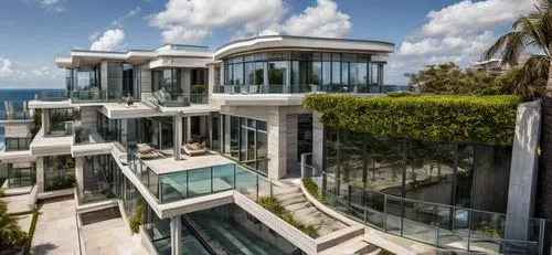 overlooking the ocean far above on the residential grounds ,luxury property,dunes house,luxury real estate,luxury home,florida home,beach house,mansion,crib,modern architecture,modern house,house by t