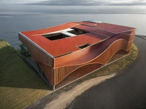 dunes house,corten steel,danish house,house of the sea,helgoland,island church,wooden sauna,archidaily,rubjerg knude lighthouse,opera house,rubjerg knude,kettunen center,cubic house,metal cladding,futuristic art museum,aqua studio,cooling house,printing house,wooden house,boat house