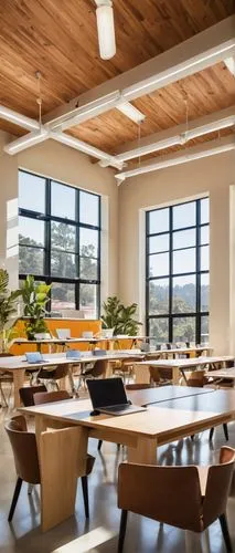 California, best interior design schools, modern architecture, glass buildings, minimalist interior, wooden accents, plants, natural light, spacious classrooms, students with laptops and design softwa