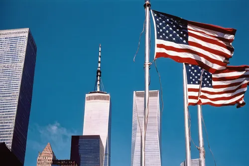 World Trade Towers With Flag In Color Photograph,flag day (usa),1 wtc,1wtc,september 11,world trade center,wtc,freedom tower,us flag,one world trade center,american flag,usa landmarks,america,united s