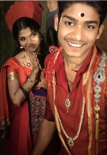 a couple are dressed in colorful clothes,lavani,anirudh,balaji,devvarman,kalyanam,kuchipudi