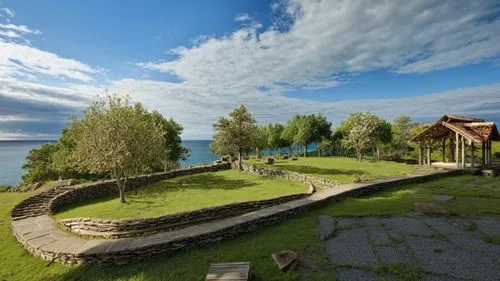 a lush green park next to the water,baikal lake,lake baikal,ladoga,ohrid,baikal,lefay,onega,residensea,arbatov,kuhmo,koli,saimaa,norway island,gotland,finlands,sveti stefan,opatija,butka,kvarken,saare