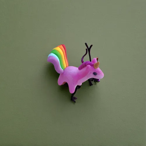 plasticine grasshopper stands on a white canvas, top view,rainbow unicorn,my little pony,unicorn and rainbow,unicorn,unicorn art,unicorns,unicorn background,scrapbook stick pin,pony,rainbow tags,ponie