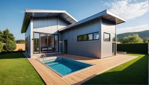 lawn,wooden decking,inverted cottage,modern house,cubic house,folding roof,3d rendering,pool house,weatherboarding,house shape,homebuilding,weatherboard,modern architecture,wooden house,deckhouse,revi