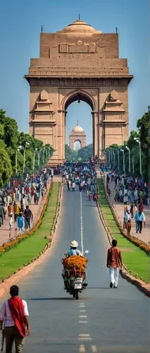 India Gate, New Delhi, majestic monument, intricate stone carvings, arched entrance, grand dome, symmetrical architecture, vibrant Indian flag, warm sunlight, clear blue sky, lush green grass, bloomin