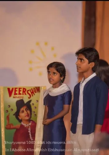 Renuka Chouhan as Amrita Kumaran with Young Englishman George looking at the Veer Kamal Magic show board at the park,vidyalayas,children learning,mahavidyas,vidyalayam,vikatan,vbs,veerasingam,velappan