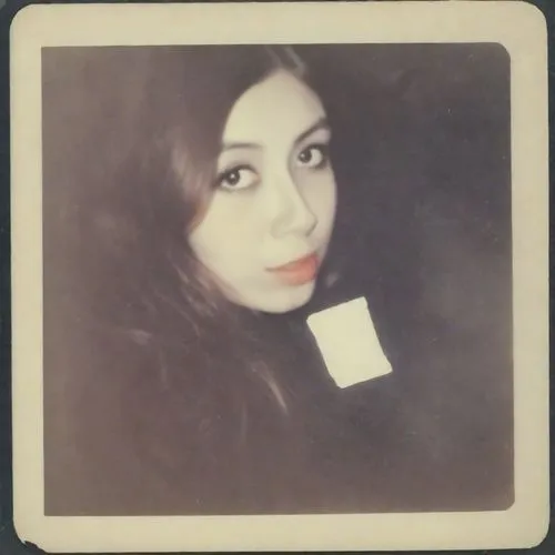 selfie  with my husband,a woman with black hair is looking at the camera,polaroid pictures,polaroid photos,tintype,pinhole,polaroid,instamatic,Photography,Polaroid