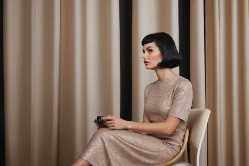 retro 60'st,black hair,model,a woman sitting on a chair wearing a short sleeve dress and holding a camera,woman holding a smartphone,elegant,dolcenera,andreasberg,sitting on a chair,woman sitting,Phot