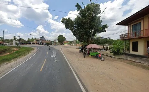 A typical long-distanced roadway in Borneo (Located in W. Kotawaringin, C. Kalimantan, Indonesia), surrounded by Brazilian and Canadian style town life.,street view,road through village,maesot,thakhek