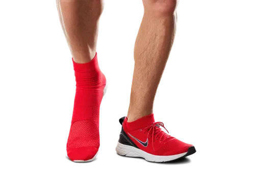 foot, bursitis, inflamed area, redness, swelling, painful expression, middle-aged man, athletic wear, sports shoes, ankle sock, running motion, slow shutter speed, dramatic lighting, low-angle shot, s