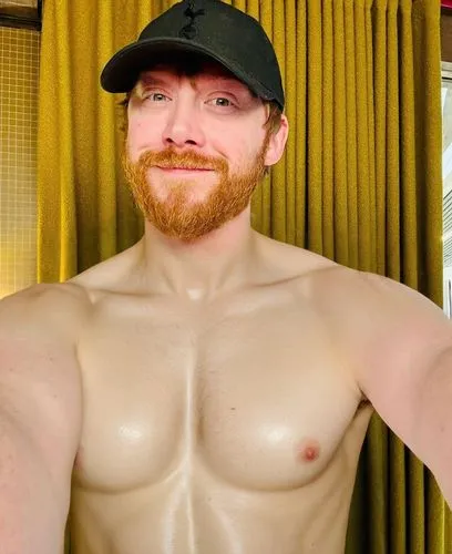 Naked man ,a man with a beard posing with his shirt off,pec,pecs,sheamus,musclebound,ginger rodgers,chest