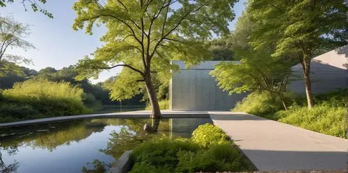 The photograph takes center stage, showcasing a quaint and minimalist design. The frame is a serene representation of a large, rectangular block in the shape of a pillar, surrounded by vibrant stonewo