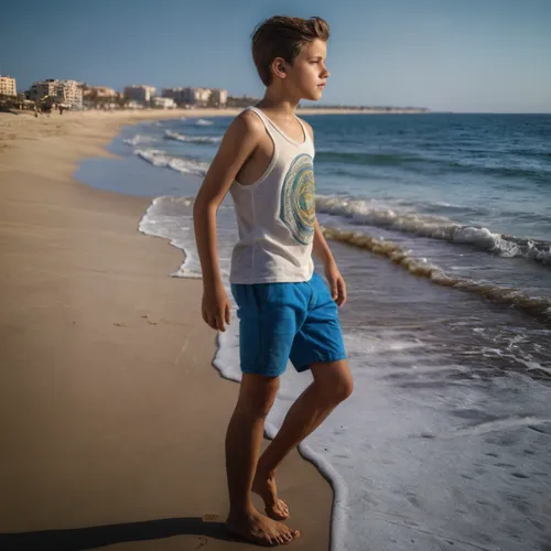 beach background,walk on the beach,boy model,jumeirah beach,beach walk,on the beach,child model,boys fashion,man at the sea,young model,skimboarding,beach shoes,digital compositing,male model,beach soccer,bermuda shorts,beach scenery,beach sports,beach towel,summer clothing