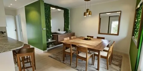 dining table sofa and chairs with a floating vanity unit having full length mirror with green climbing plants on both sides and a pendant style chandelier above, wall are white in color with photo fra